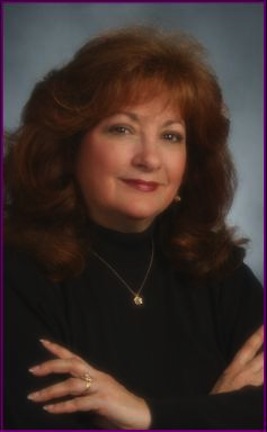 Monica Reo, the woman behind the dolls.