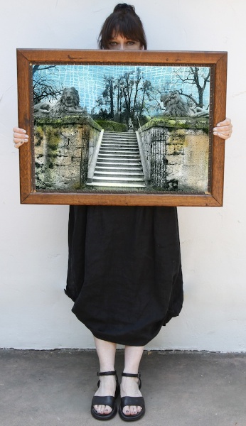 Angela Cartwright holds her original work “Lions Share.”