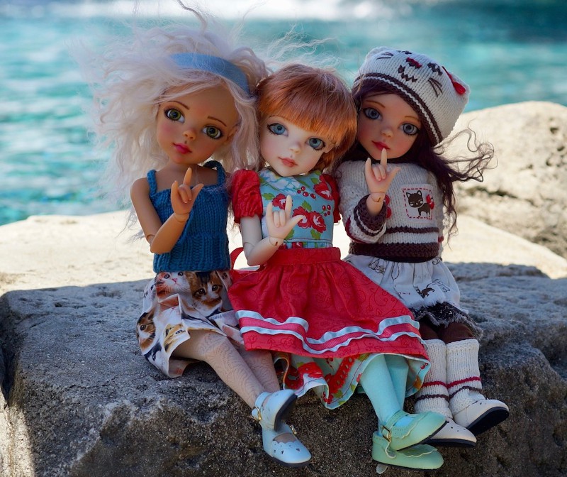 Bo Bergemann’s dolls say “I love you” in American Sign Language.