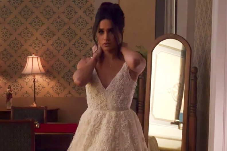Meghan Markle clad in her wedding-gown costume in “Suits,” Courtesy of USATV