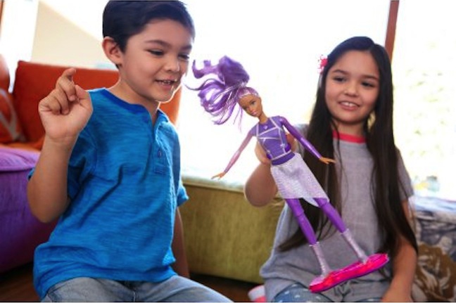 Boys and girls alike respond to the Starlights Hoverboard Barbie