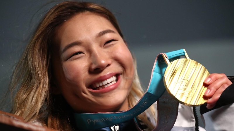 Chloe Kim with her first Olympic Gold