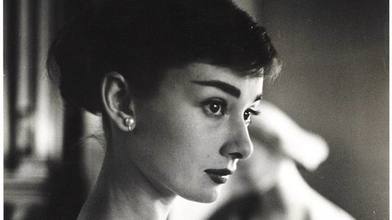 Audrey Hepburn wearing pearl earrings